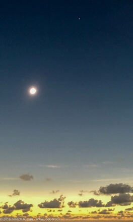 A fully eclipsed Sun with Venus and Mercury above it, observed from the Java Sea, Indonesia on March 9th 2016 (Photograph  Joseph A Carr)